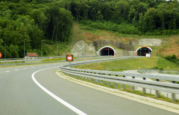 istock Tunnels in the both directions on the modern multiple lane highway 1161991751
