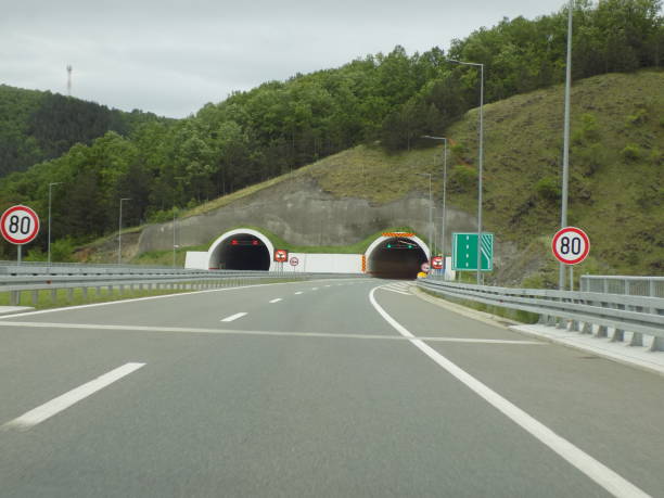 istock Tunnels in the both directions on the modern multiple lane highway 1161991755