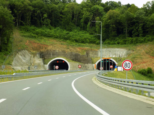 istock Tunnels in the both directions on the modern multiple lane highway 1161991764