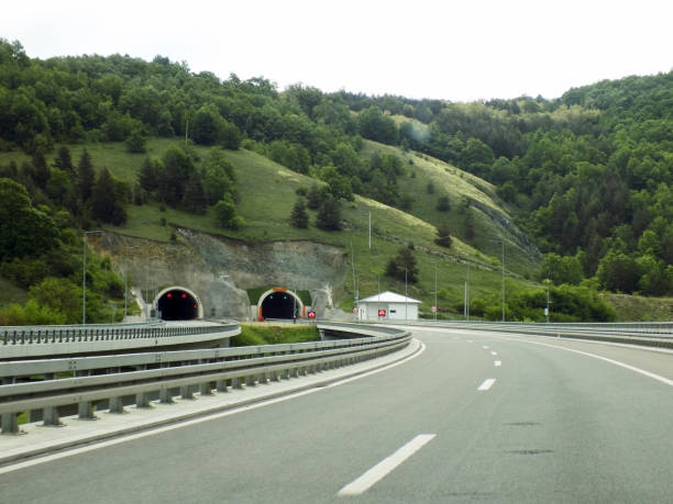 istock Tunnels in the both directions on the modern multiple lane highway 1161991766