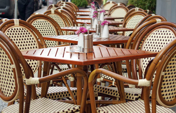 istock Tables and chairs on empty terrace of a street cafe 1161992166