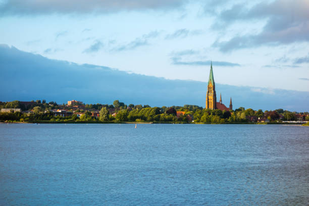 panorama of schleswig with church and schleie - schleswig imagens e fotografias de stock