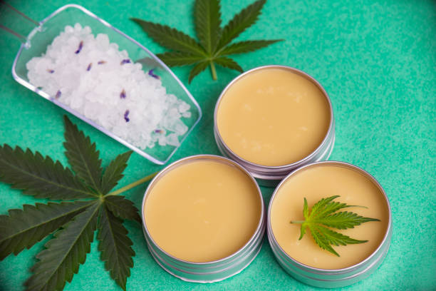 Cannabis wellness products with bath bomb, soaking salts and marijuana salve Assortment of cannabis wellness products with bath bomb, soaking salts and marijuana salve - cannabis spa concept relief map photos stock pictures, royalty-free photos & images