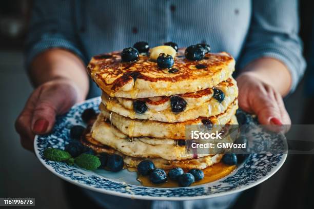 Stack Of Pancakes With Maple Syrup And Fresh Blueberries Stock Photo - Download Image Now