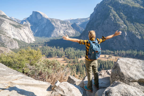 istock Arms wide open, man embracing nature 1161996944