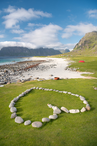 Huge Stone Heart at the famous Uttakleiv Beach, Leknes, Lofoten, Norway. It is internationally ranked as one of the most romantic beaches on this planet. Nikon D850. Converted from RAW.