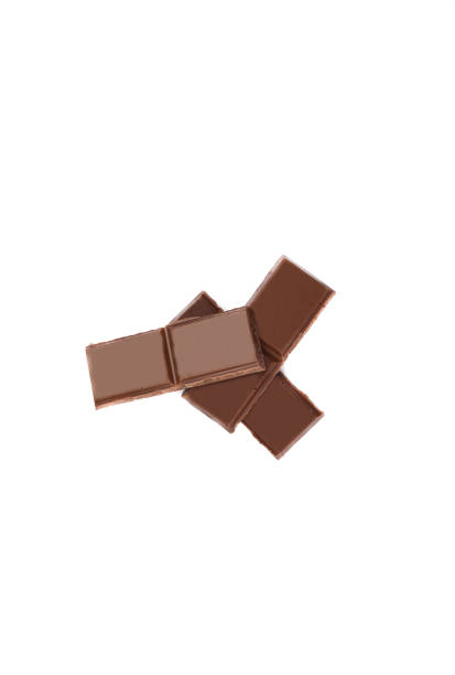 istock Milk organic chocolate pieces isolated over white background. 1162006625