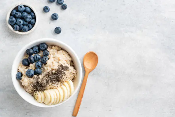 Photo of Healthy Breakfast Oatmeal Bowl With Banana, Blueberry