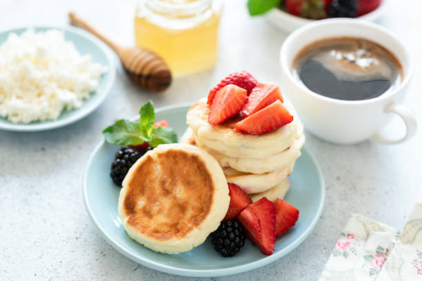 istock Curd cheese fritters, syrniki or cheese pancakes 1162008001