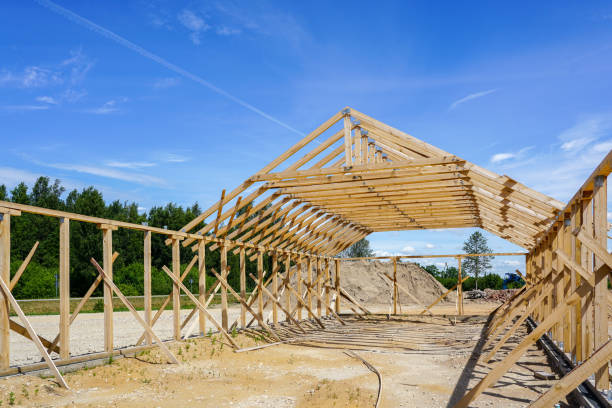 istock Frame of a new wooden house under construction 1162009945