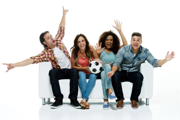 Four happy soccer fans