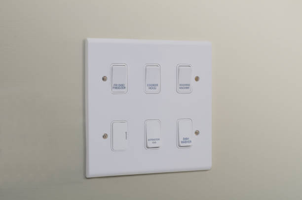 istock Mains electricity isolator switch panel fitted to wall in domestic kitchen 1162015553