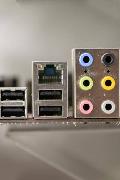 istock Connectors on the old motherboard for a personal computer close 1162016314