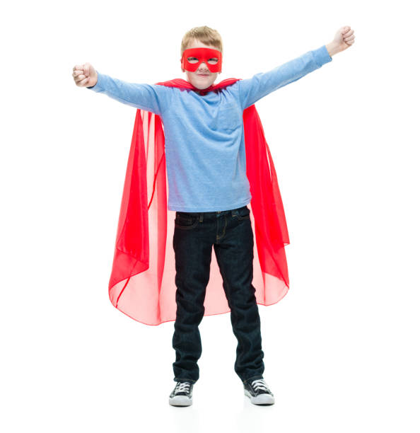 istock 8 year old boy wearing superhero costume 1162020711