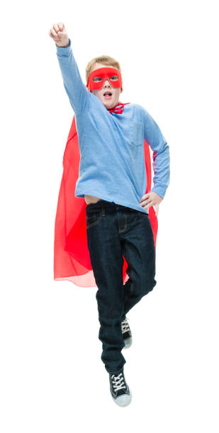 istock 8 year old boy wearing superhero costume 1162020728