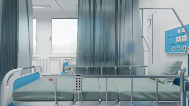 istock Medical Beds Separated by Nylon Curtains Inside a Recovery Room 1162026454