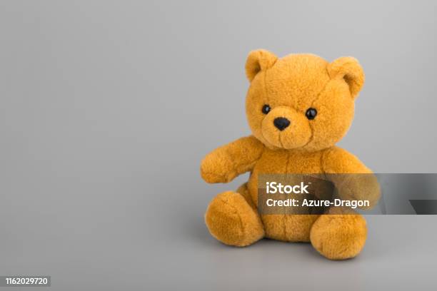 Teddy Bear On Grey Background Copyspace Stock Photo - Download Image Now - Childhood, Day, Toy