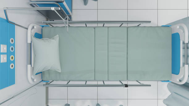 Top View of Single Medical Bed in Bright Light 3D Rendering hospital bed high angle stock pictures, royalty-free photos & images