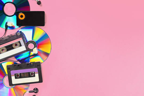 The concept of evolution music. Cassette, CD-disk, mp3 player. Vintage and modernity. Music support.