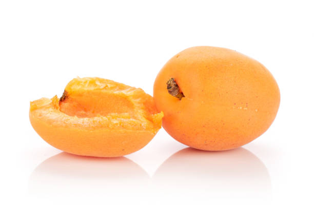 istock Fresh orange apricot isolated on white 1162041634