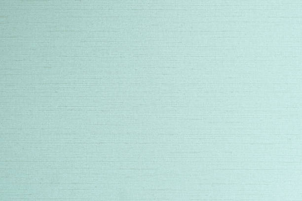 istock Cotton silk blended fabric wall paper texture pattern background in pastel white pale green blue mint color 1162044587