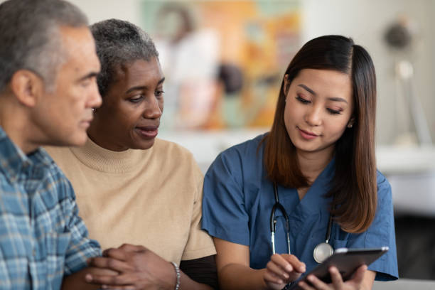 istock Sharing results with an elderly couple 1162045217