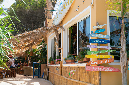 26th June 2019 - Ibiza, Spain. Relaxing Bar-Restaurant 'On The Beach' situated at Cala San Vicente resort.
