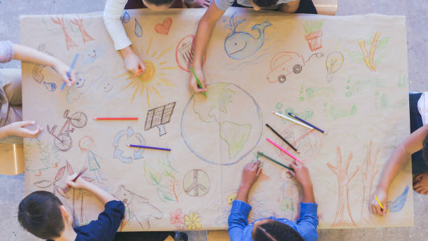 istock Group of children color environmentally conscious mural 1162045341