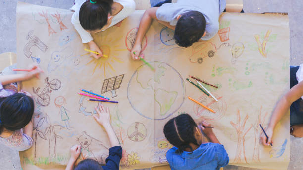 istock Group of children color environmentally conscious mural 1162045344