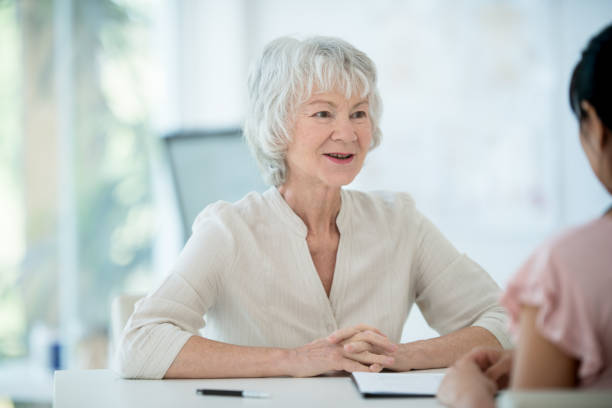 istock Senior woman meets with her physician 1162045501