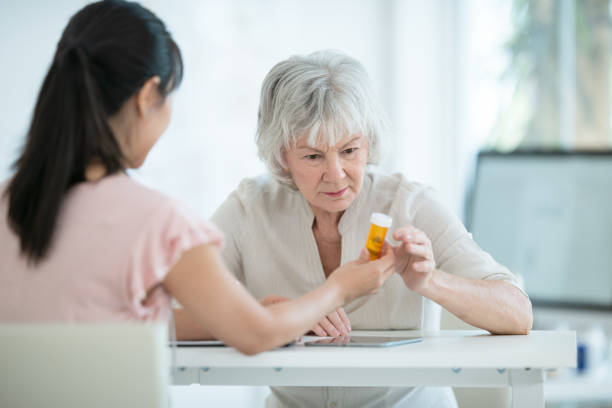 istock Senior woman meets with her physician 1162045514