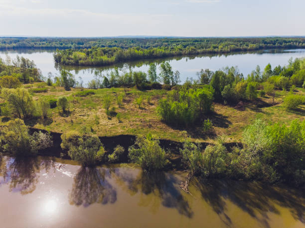 istock Field and river in summer, shooting from a quadcopter. 1162045803