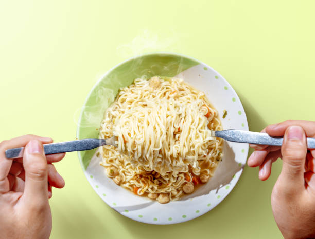 istock People eat the noodles with fork 1162064461