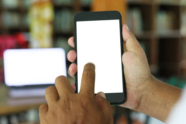 istock hand holding smart phone with blank screen isolated on white 1162065042