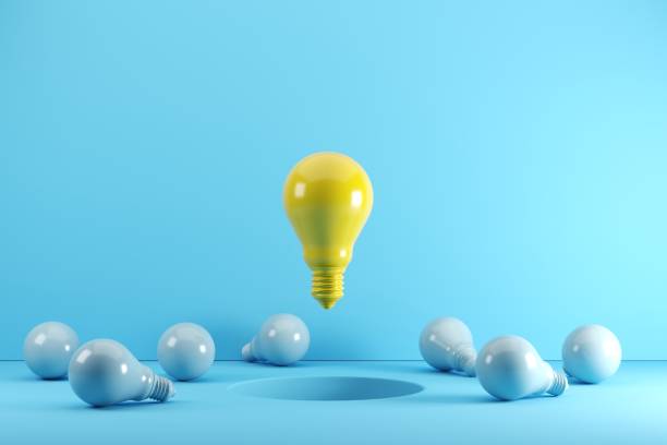 istock A yellow Light bulb floating on hole Surrounded with blue light bulbs. Idea creative Concept. 3D render. 1162065320