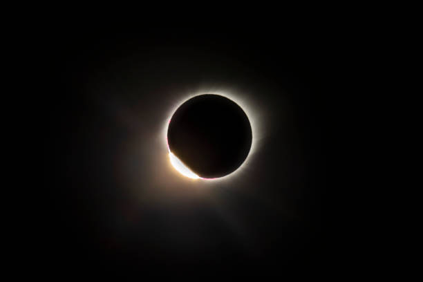 istock The Baily's beads effect and Diamond Ring effect during Total Solar Eclipse Chile 2019, amazing view of the Sun covered by the Moon during totality phase while the last sunbeams pass the Moon craters 1162066503