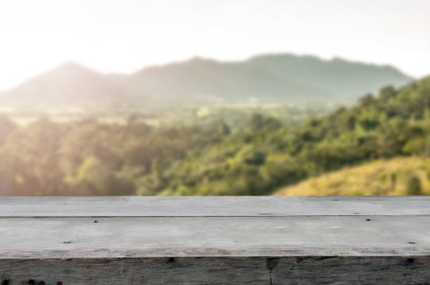 istock wooden table top and blur background 1162074938