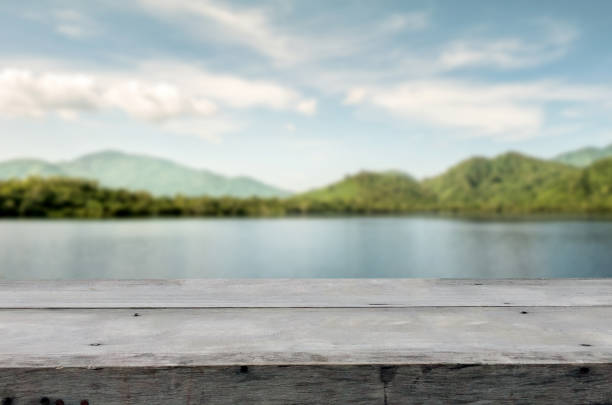 istock wooden table top and blur background 1162074939