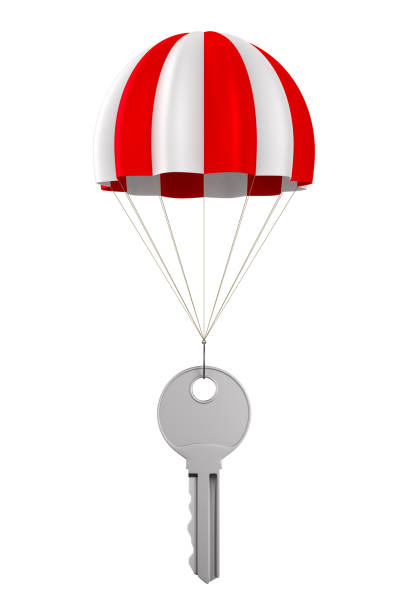 istock metallic key and parachute on white background. Isolated 3D illustration 1162077821