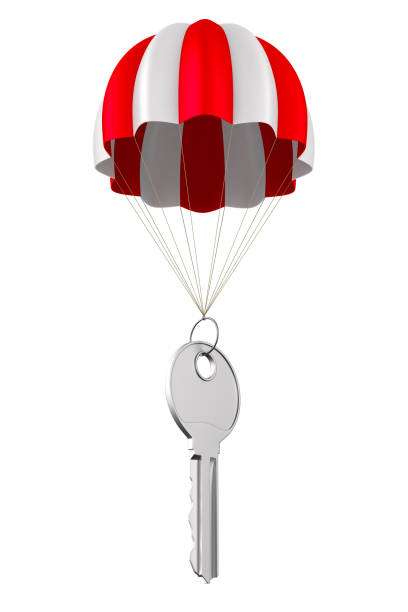 metallic key and parachute on white background. isolated 3d illustration - parachuting open parachute opening imagens e fotografias de stock