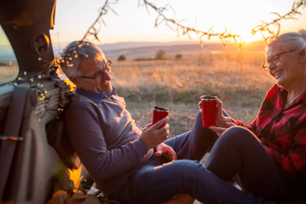 istock Senior couple outdoors with car 1162078667