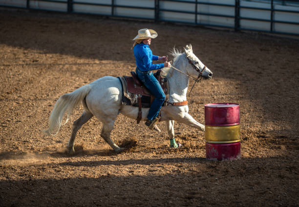 istock Young cowgirl barrel racing rodeo 1162080489