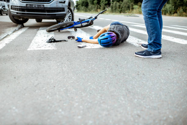 istock Road accident with injured cyclist 1162084601