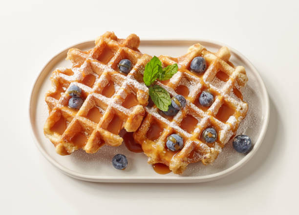 istock plate of belgian waffles dessert 1162086647