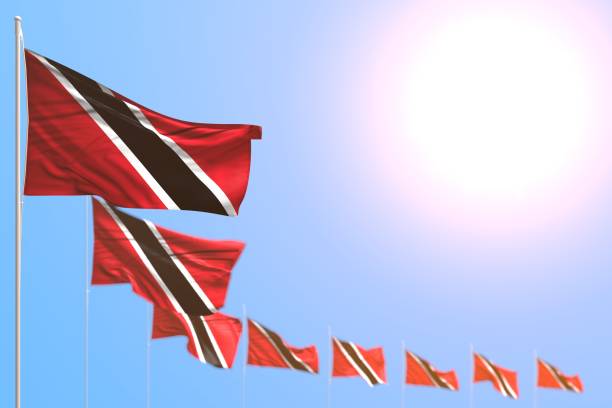 istock wonderful many Trinidad and Tobago flags placed diagonal with selective focus and empty space for content - any feast flag 3d illustration 1162089200
