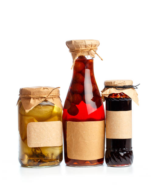 istock set og  glass bottles with preserved food on white background - Image 1162089519