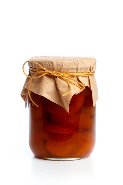 istock glass bottle with preserved food on white background 1162090422