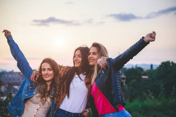 istock Three teenage girls having fun 1162091797