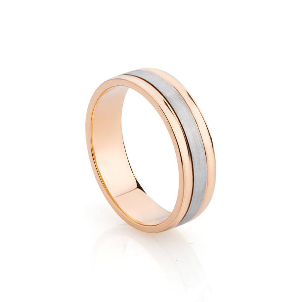 istock Pink gold and white gold wedding ring isolated on white 1162092917