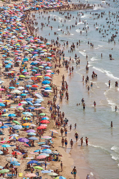 istock Mediterranean coastline in Spain. Calpe beach. Summer crowd. Alicante 1162093182